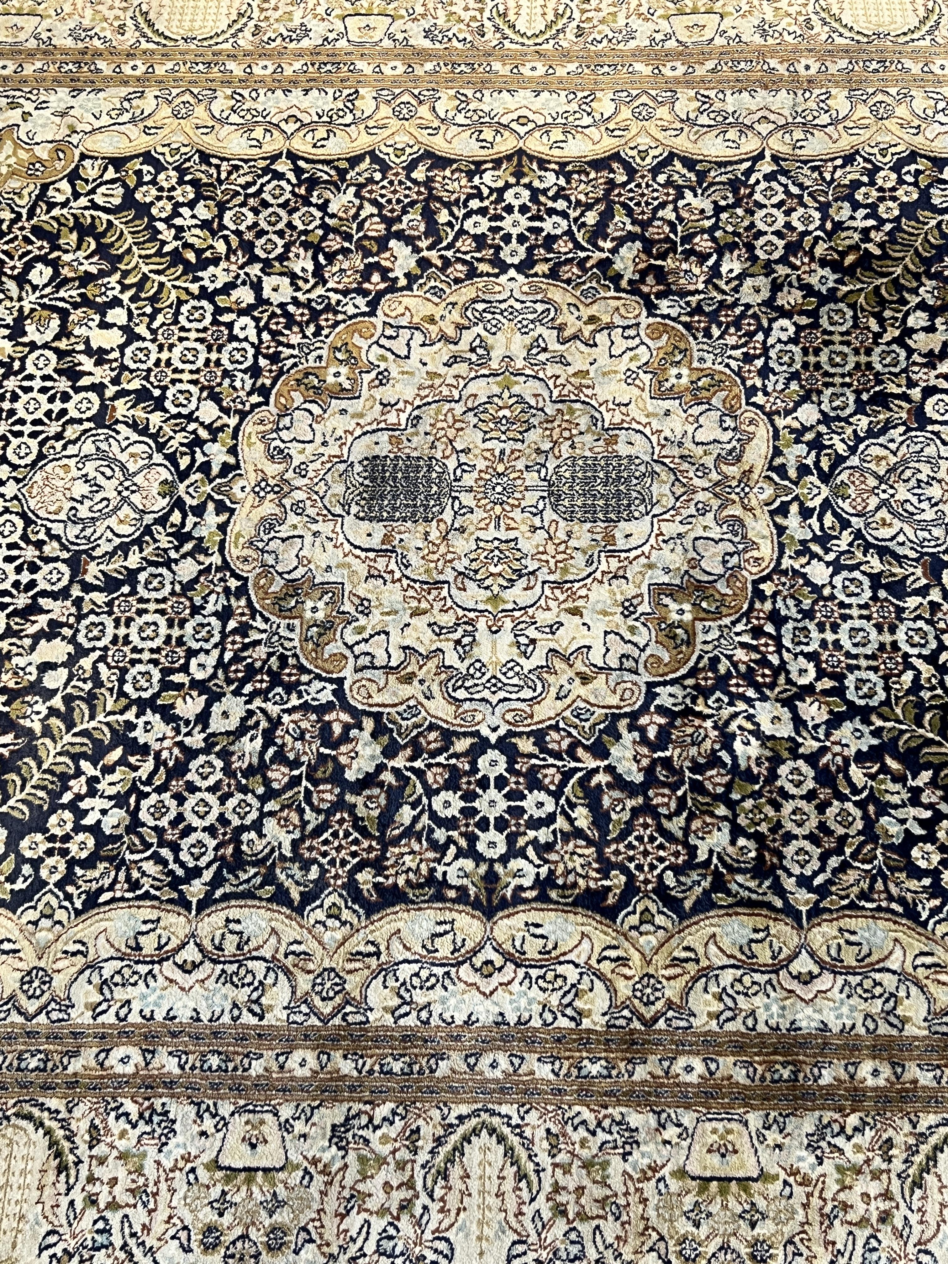 A Persian silk rug, 180 x 120cm